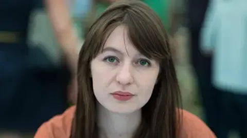 Irish author Sally Rooney claims she cannot visit the UK because of legal concerns